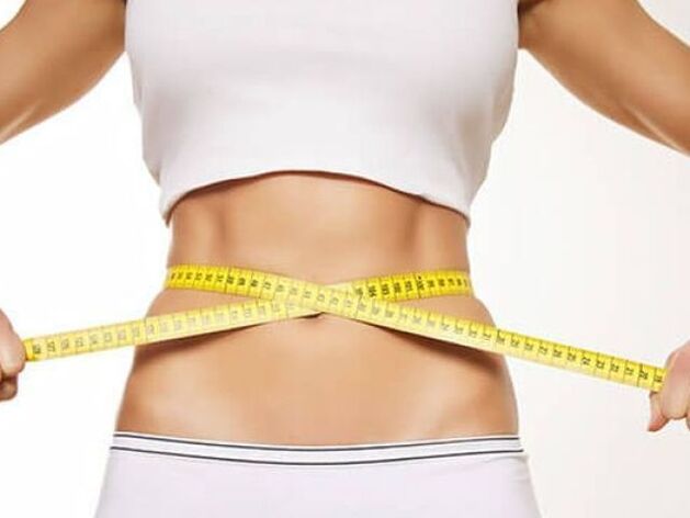 The waist of the waist with a centimeter ribbon